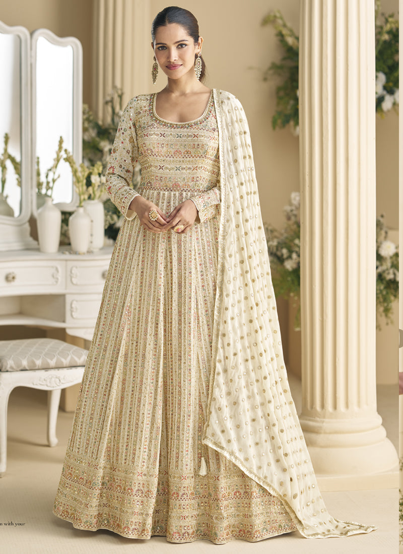 Close up of off white georgette anarkali suit with detailed Seroski and Zarkan embroidery