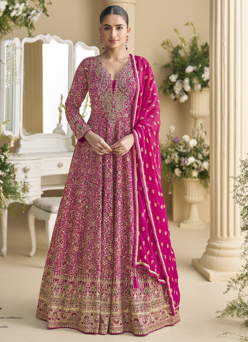 Pink georgette Anarkali suit with Seroski Zarkan and detailed embroidery.