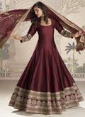 Maroon viscose jacquard silk embroidered floor-length gown with matching dupatta for wedding events