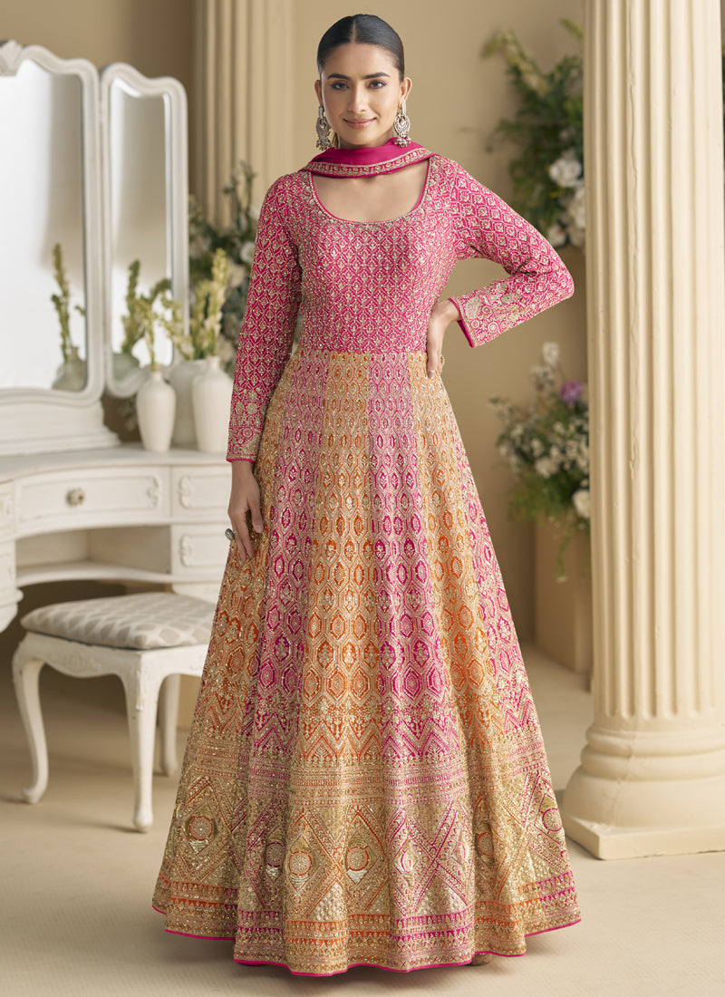 Elegant pink gown adorned with Seroski and Zarkan embroidery with matching dupatta