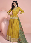 Yellow jacquard silk lehenga style suit with intricate embroidery and gota patti details
