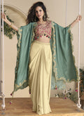 Beige Chinon silk western-style suit with intricate embroidery and shrug overlay.