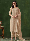 Cream Rangoli silk salwar suit featuring zari, gota patti, and resham thread embroidery