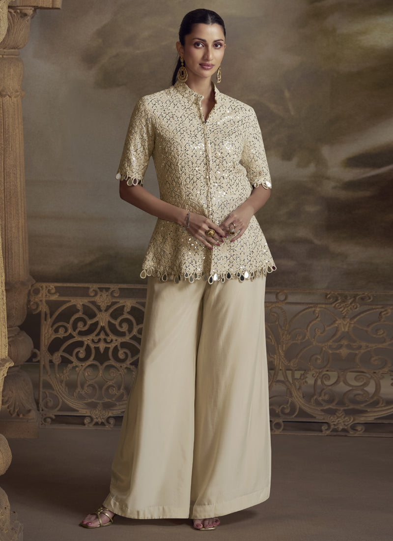 Cream colored georgette palazzo suit with intricate embroidery and gota patti detail