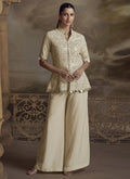 Cream colored georgette palazzo suit with intricate embroidery and gota patti detail