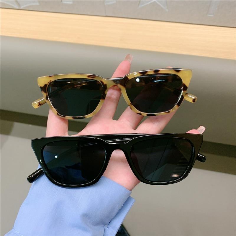 Vintage narrow cat eye sunglasses in a retro designer style, available in multiple colors.
