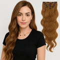 24-inch body wave clip-in extensions in light-brown and blonde-highlights with ClipeX system