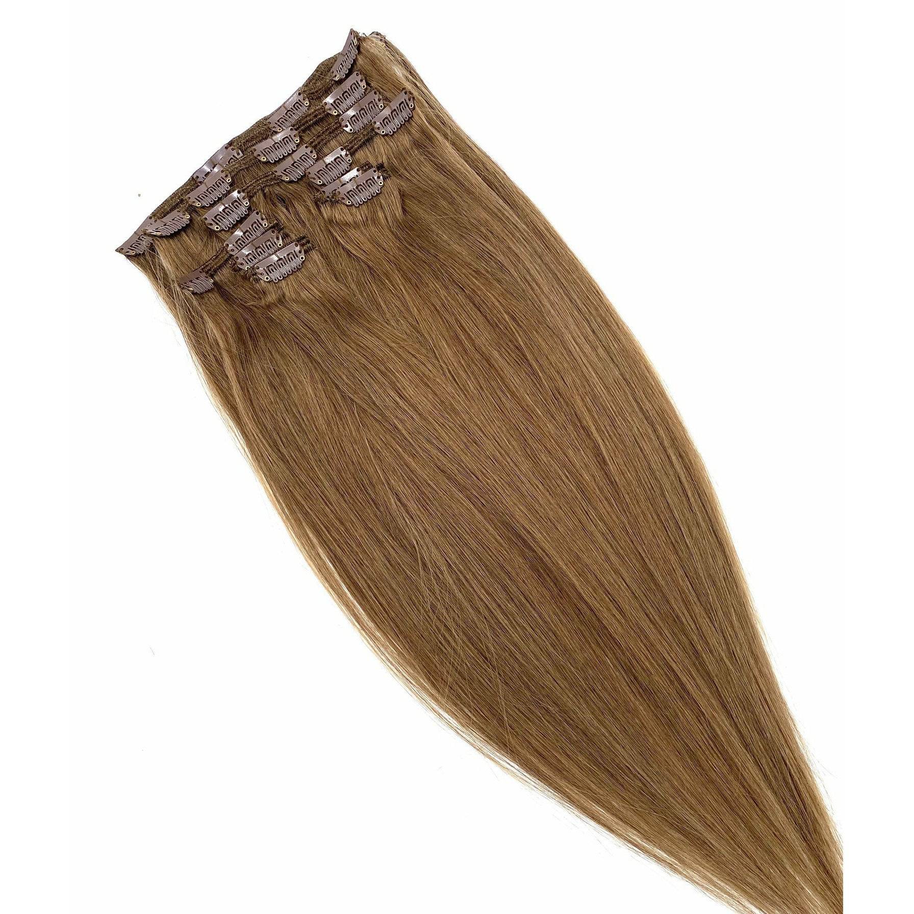 Woman wearing 18-inch silky straight blonde human hair clip-in extensions