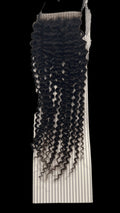 Close up of 4x4 bohemian virgin hair closure in natural black with a soft, natural texture.