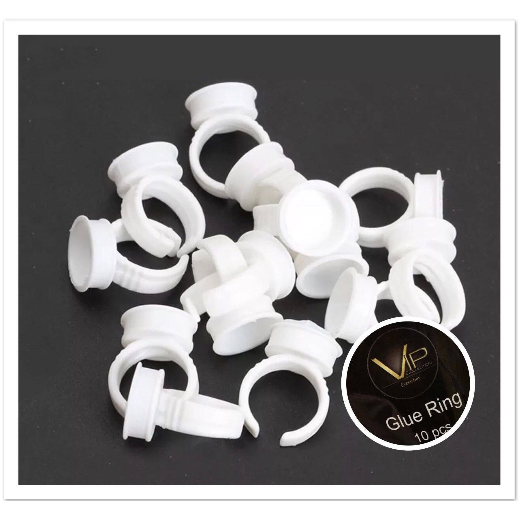 10-pack of white eyelash glue rings for professional lash application