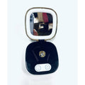 Black and gold portable Nanomister with integrated mirror