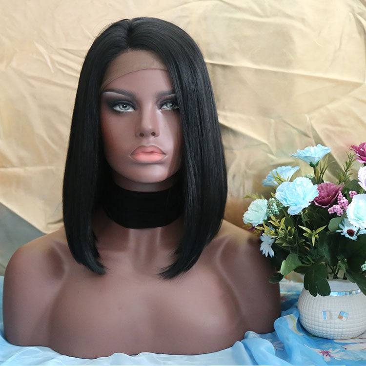 14-inch synthetic lace front wig in Color 1B on a mannequin head