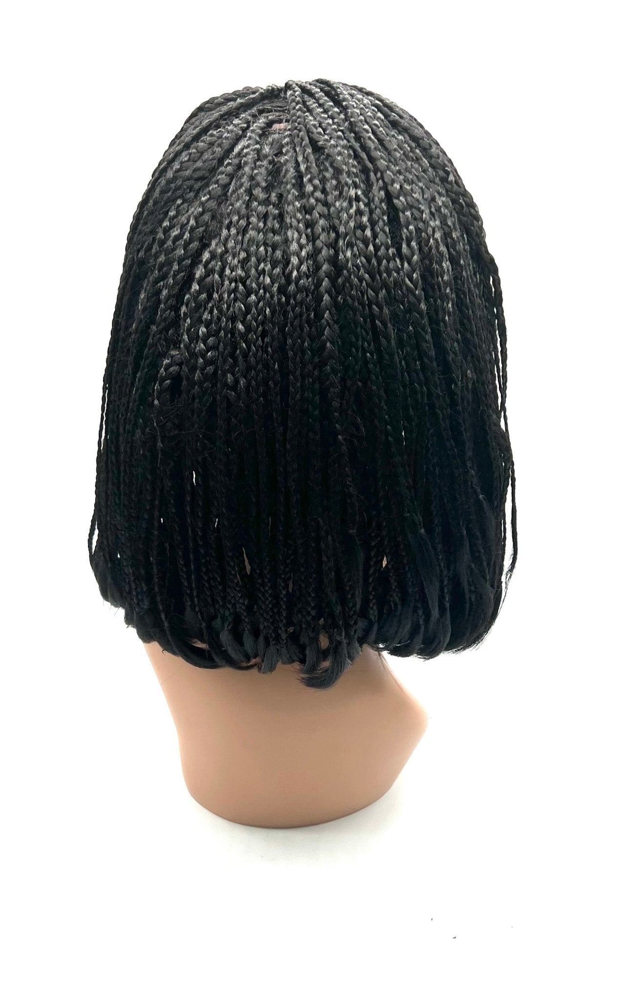 Model wearing a 14-inch synthetic lace front wig with a natural, heat-styled finish.