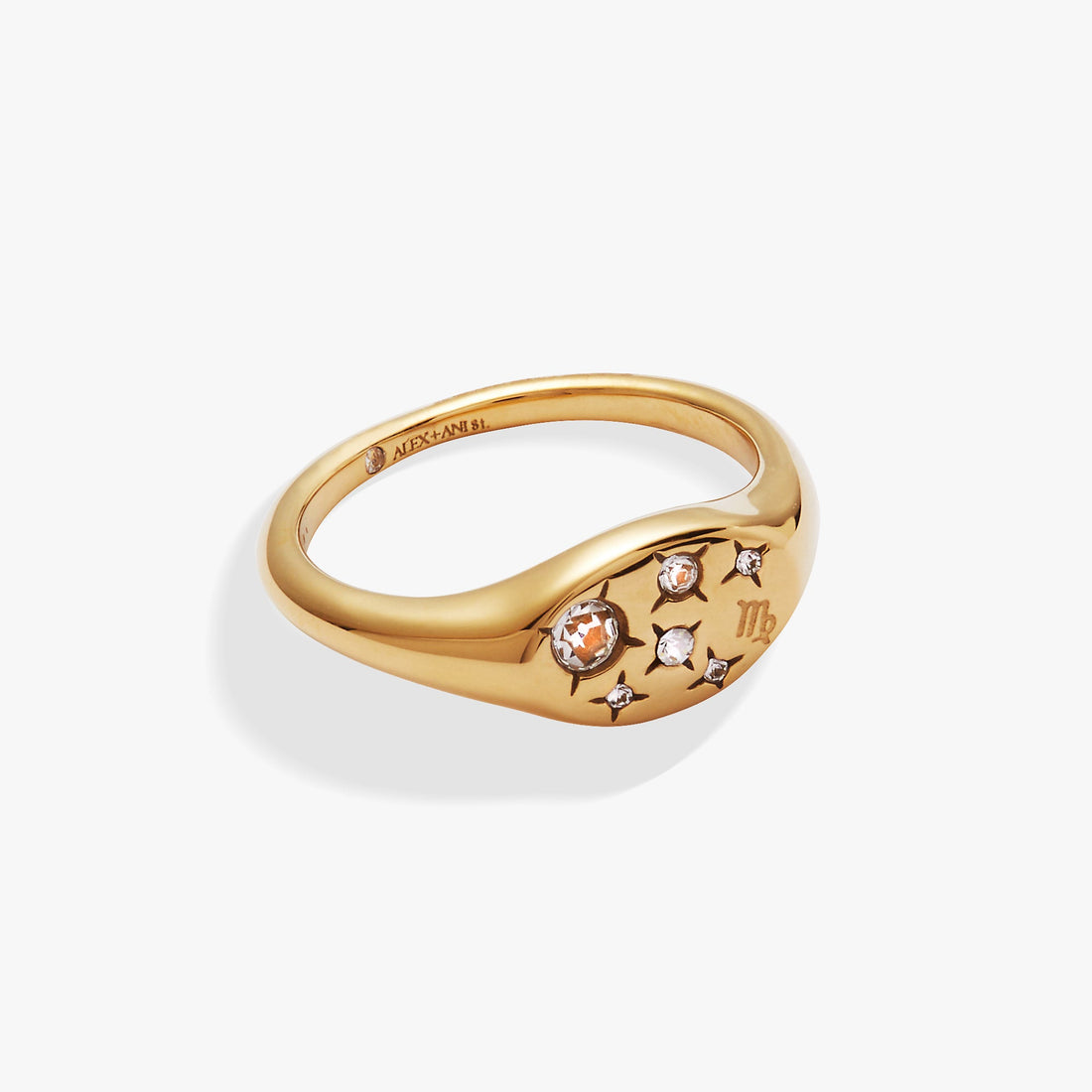 Virgo signet ring in polished gold-plated finish with flush-set clear crystals, worn on a hand.