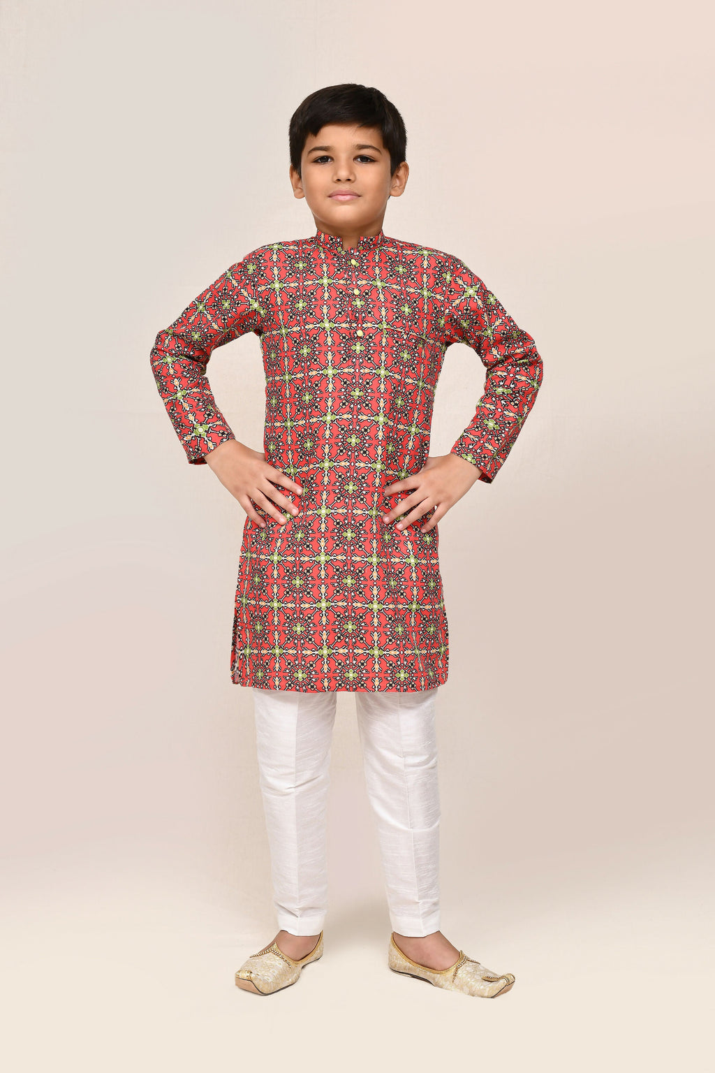 Red printed cotton kurta paired with white straight-fit art silk pants