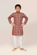 Red printed cotton kurta paired with white straight-fit art silk pants