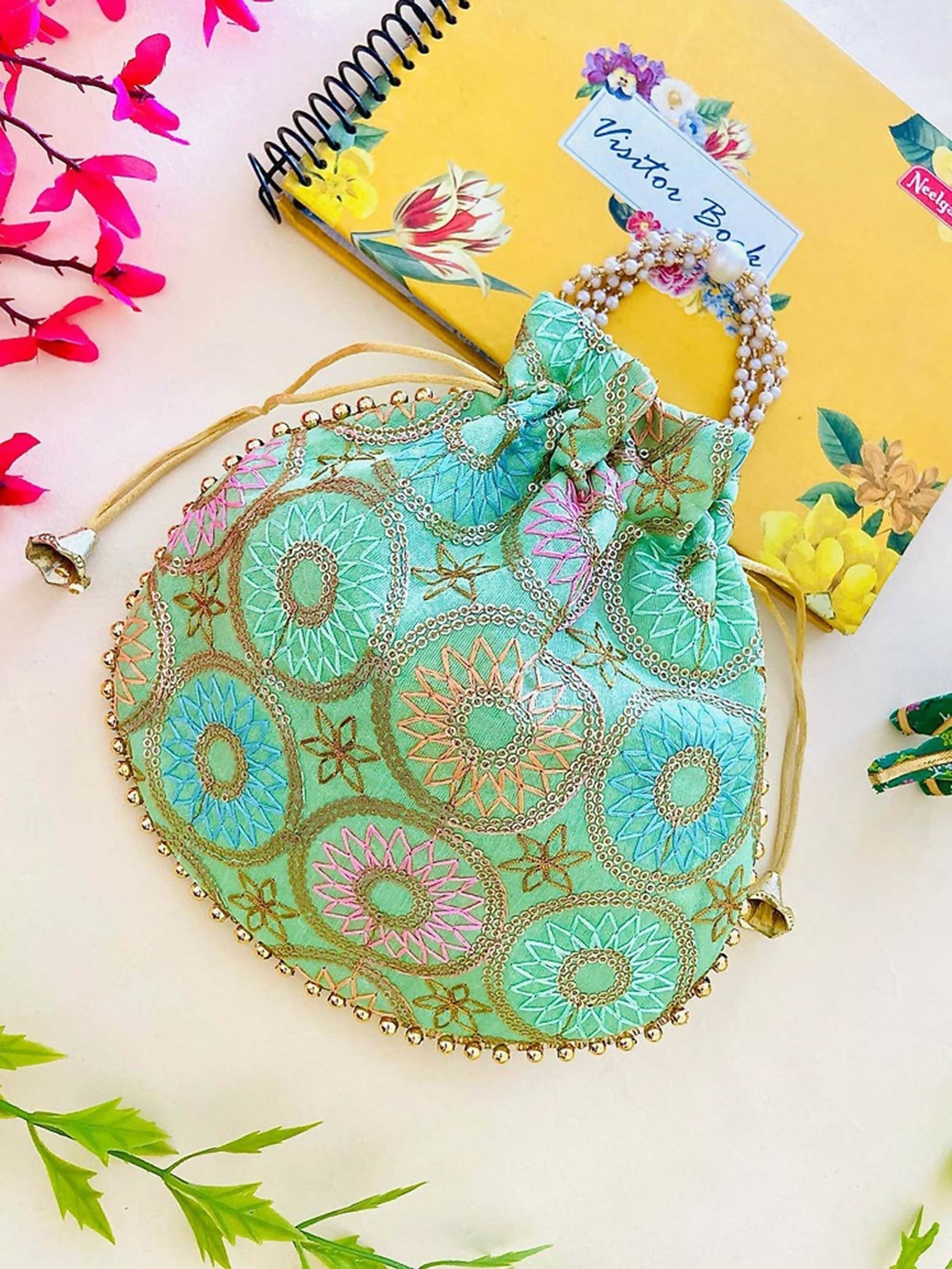 Mint green and gold geometric print bohemian potli bag for women