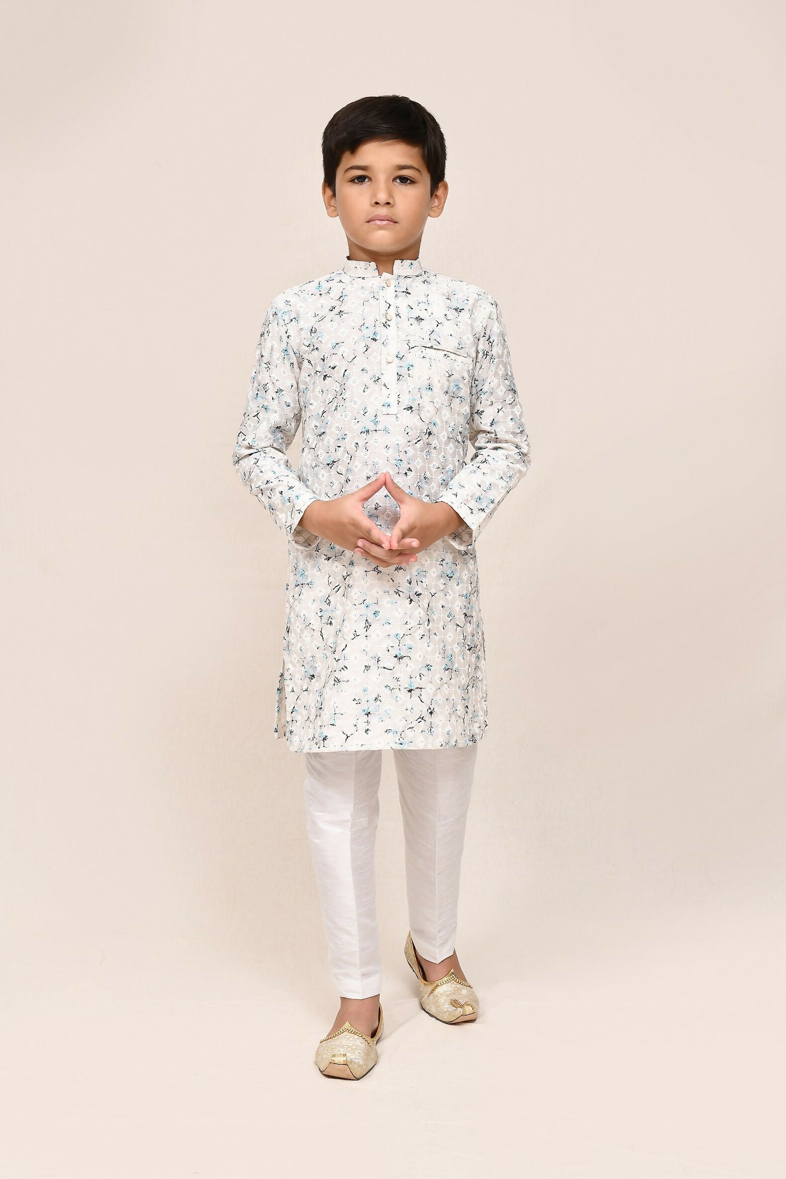 White cotton kurta with detailed thread work and straight fit art silk pants