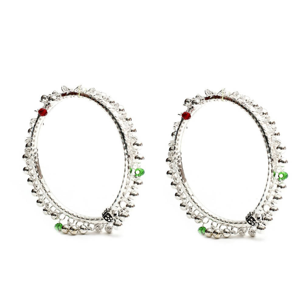 Traditional oxidised silver anklets with intricate metal muvvas for a classic ethnic look.