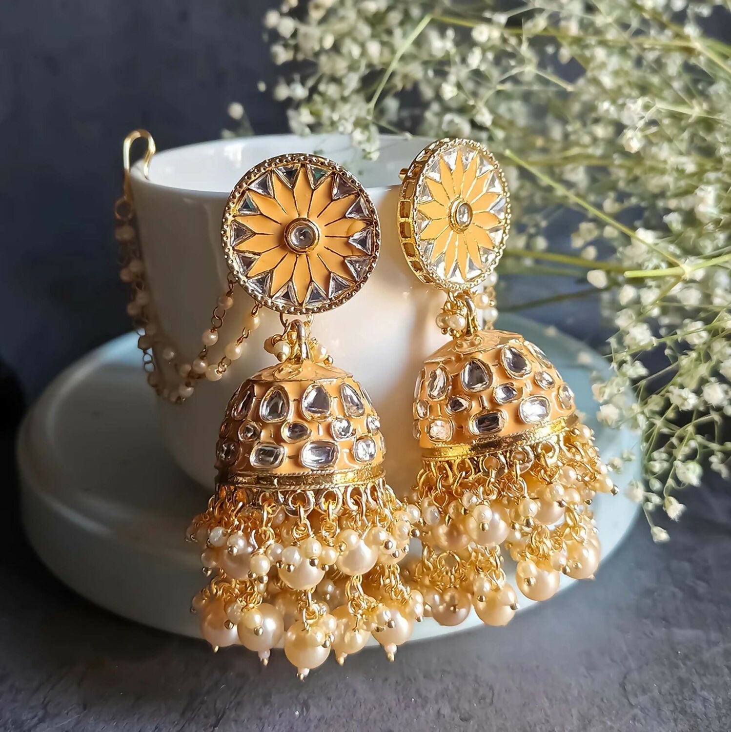 Light Orange Kundan Jhumka earrings crafted from brass