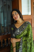 Green Chanderi Cotton saree with traditional Batik print and matching unstitched blouse piece