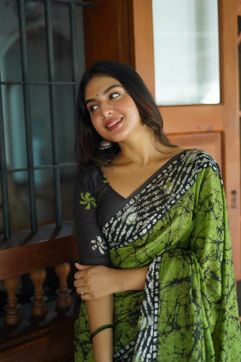 Green Chanderi Cotton saree with traditional Batik print and matching unstitched blouse piece