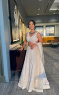 Off White Georgette designer lehenga choli with sequins and thread embroidery
