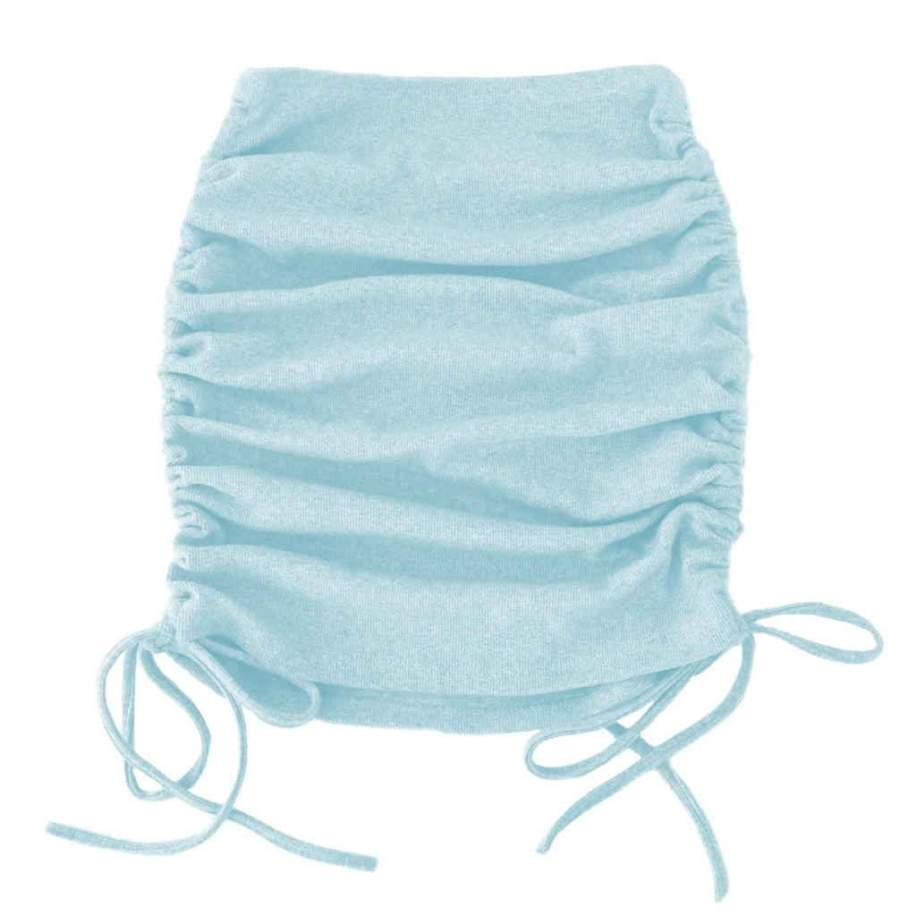 Close-up front view of a ruched side-drawstring mini skirt in light blue and grey