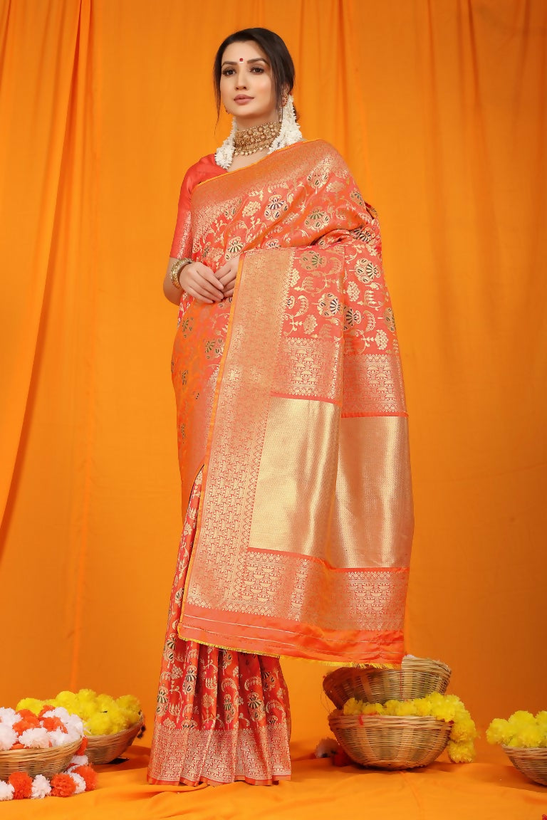 Vibrant Orange Kanjivaram Silk saree with traditional Zari woven detailing.