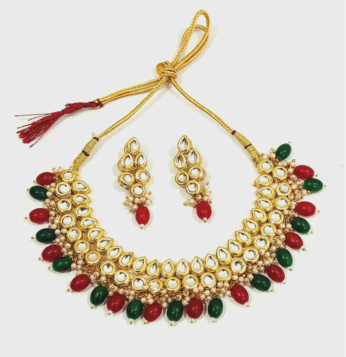 Elegant handmade gold-plated Kundan jewellery set with traditional stone detailing