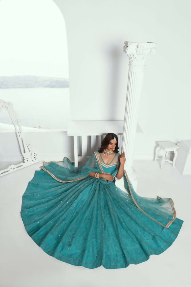 Rama Green Butterfly Net Lehenga Choli with Sequence Embroidery