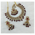 Royal maroon stone work necklace set with matching earrings for a classic traditional look