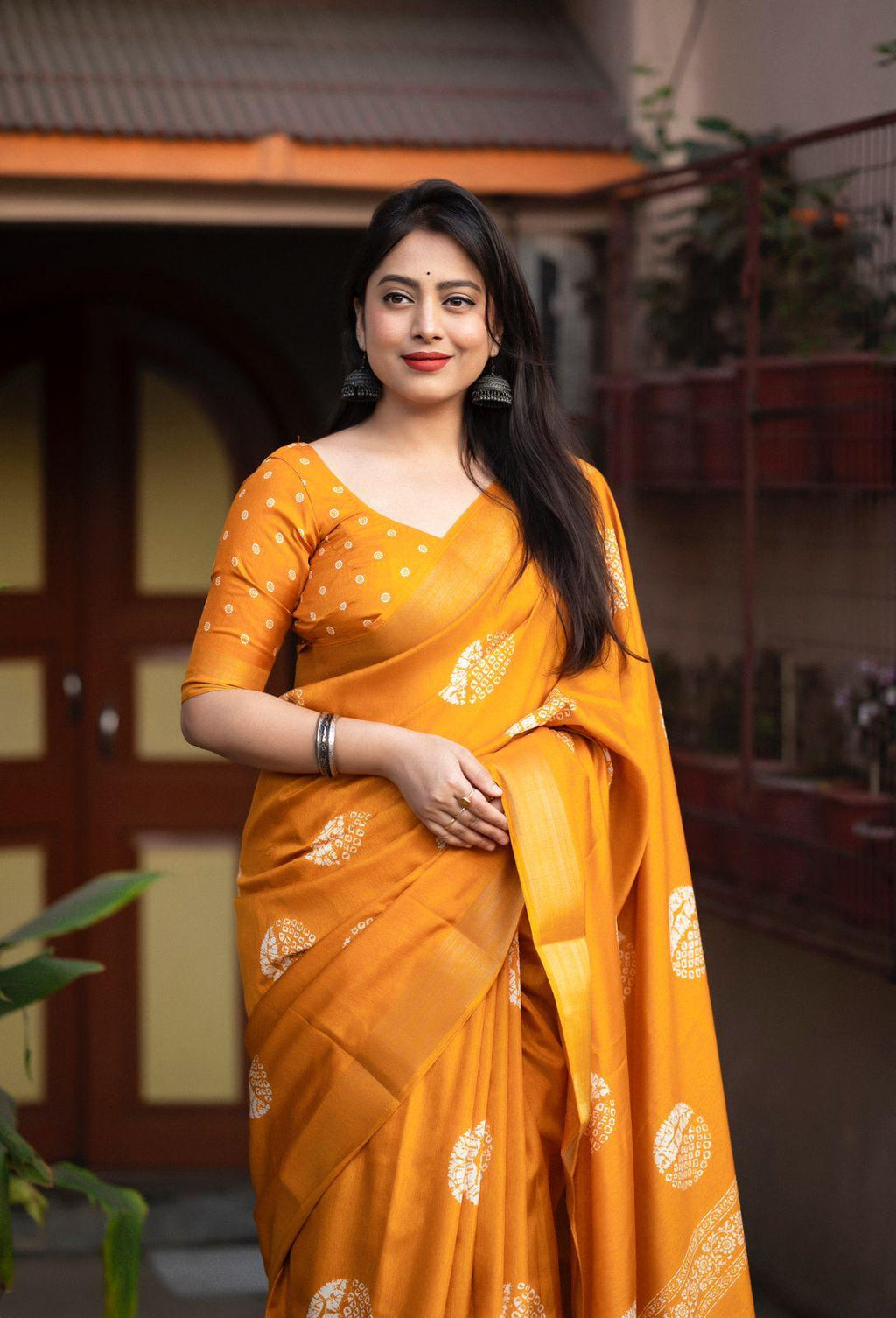 Mustard Cotton Crepe Saree with Batik Print and Zari Border