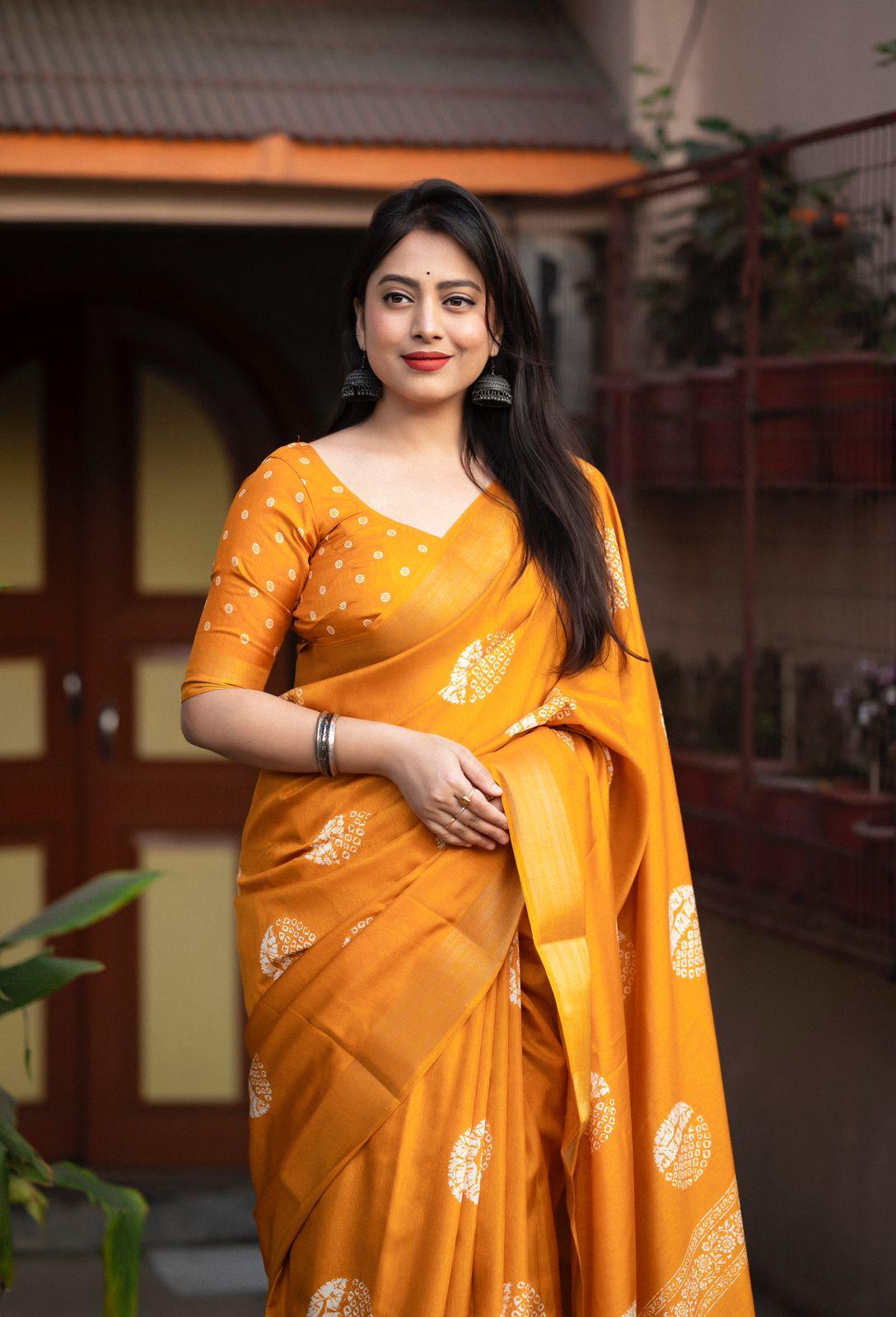 Mustard Cotton Crepe Saree with Batik Print and Zari Border