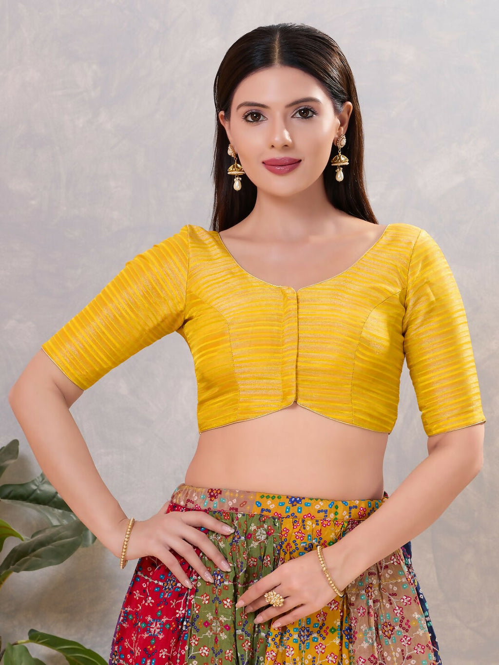 Women's yellow silk V-neck stitched blouse
