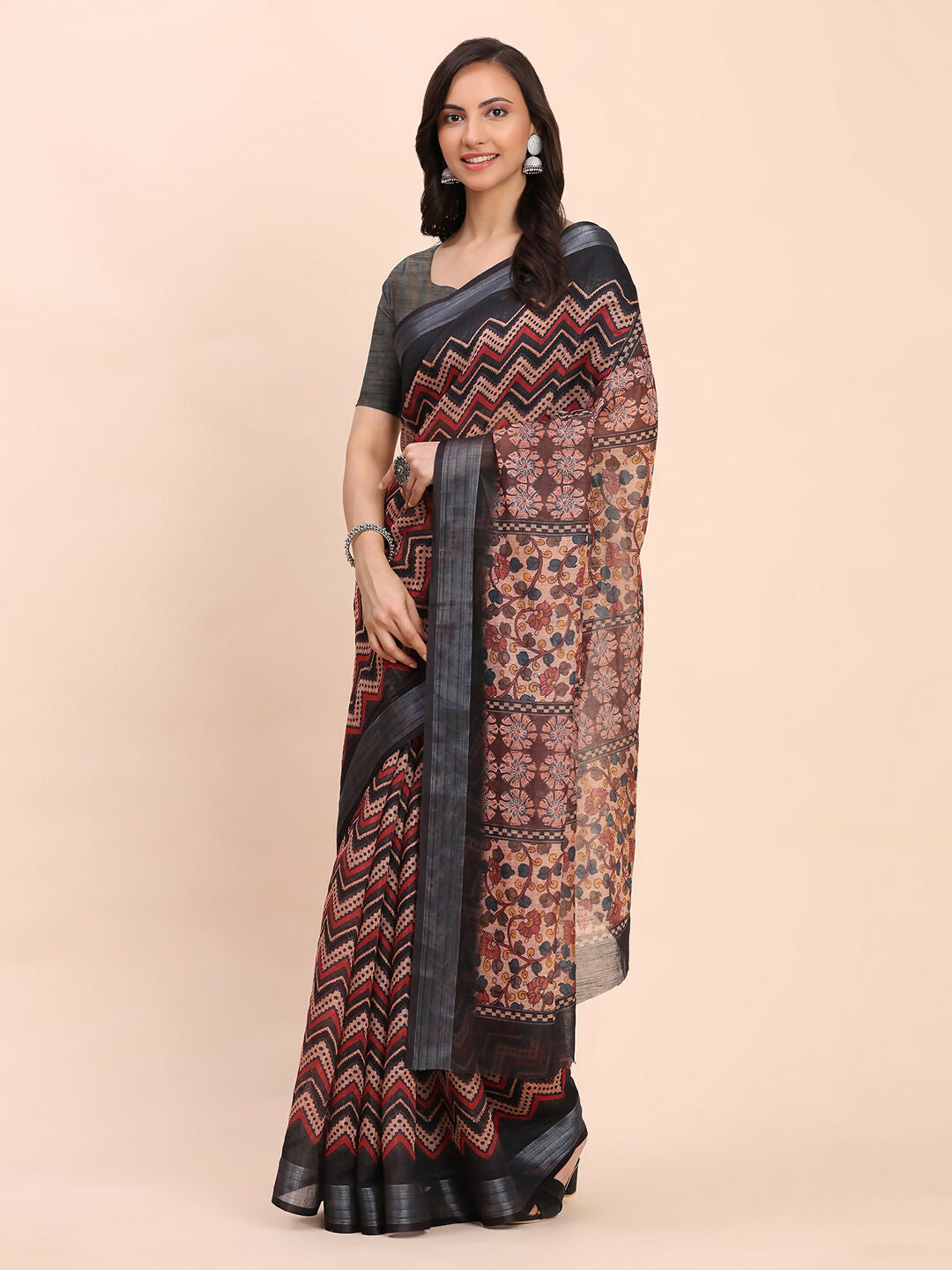 Classic black linen cotton saree with a matching black blouse piece.