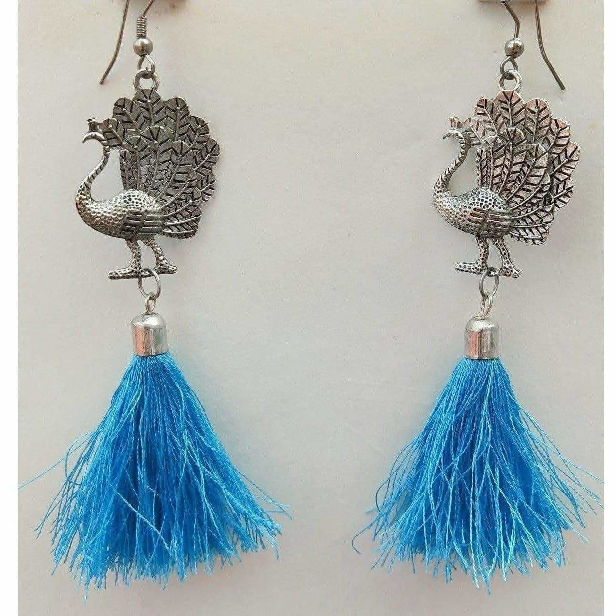 Blue silk thread tassel earrings with silver oxidized peacock motif