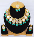 Elegantly styled Blue Kundan necklace with intricate gold-plated detailing and adjustable cord.