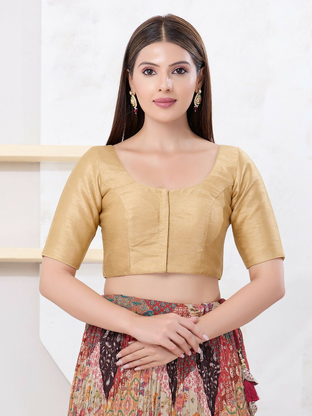 Gold Dupion silk sleeveless blouse with front open design and round neck