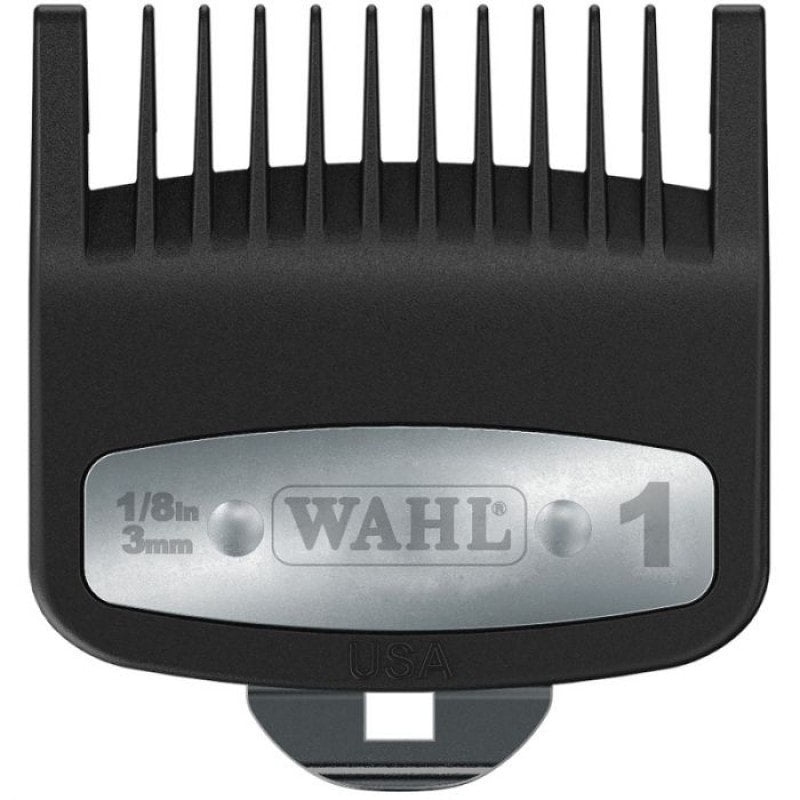 Close up of black and silver #1 premium 1/8 inch hair clipper attachment comb on a neutral background.