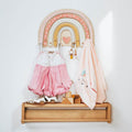 Colorful rainbow wall hanger with heart-shaped hooks for kids' room decor