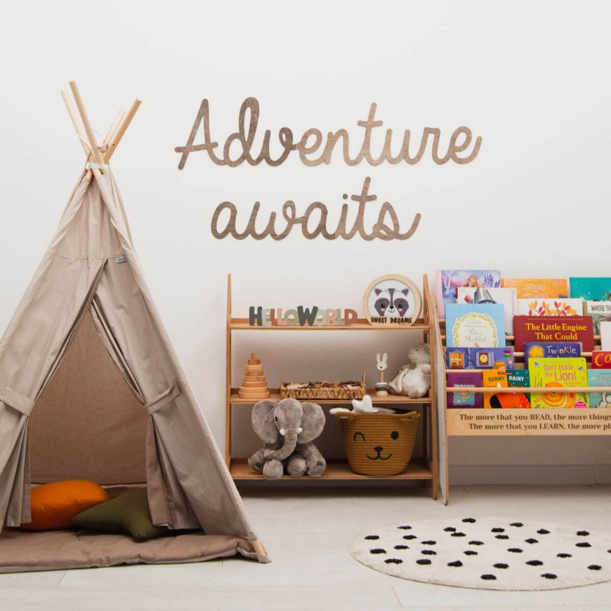 Minimalist wooden nursery sign in soft brown and beige colors hanging on a nursery wall.