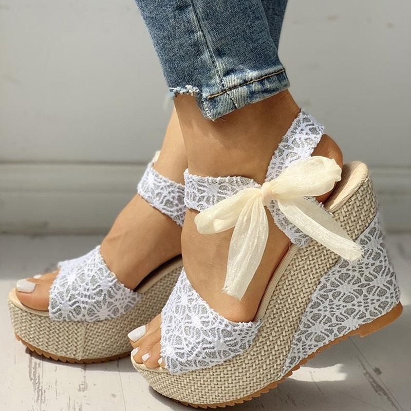 Romantic white lace platform heels with bow and ankle strap