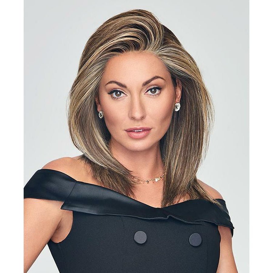 Model wearing a professional Well Played wig in a classic blonde shade.