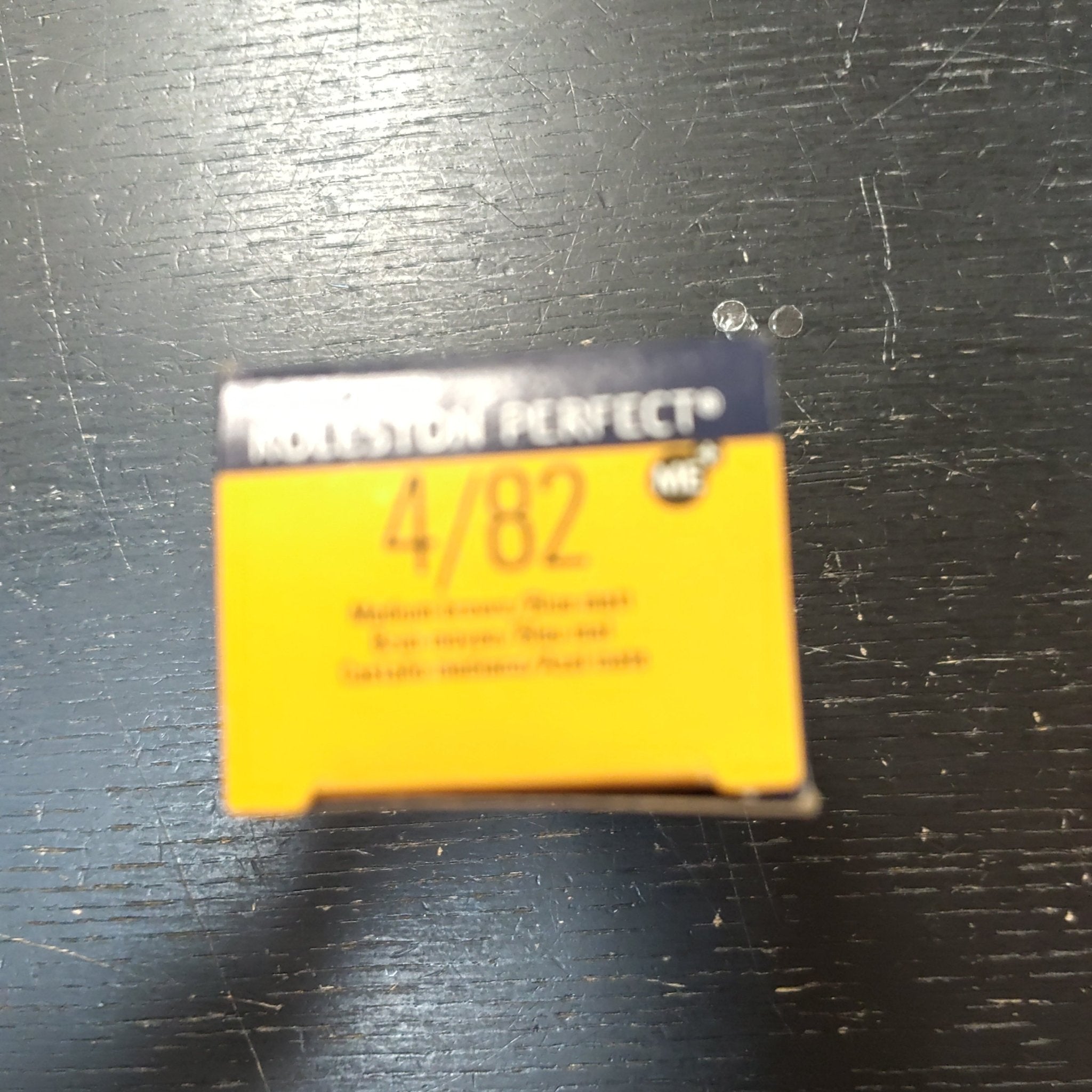 Wella Koleston Perfect Color 4/82 bottle in Medium Brown Violet Pearl shade
