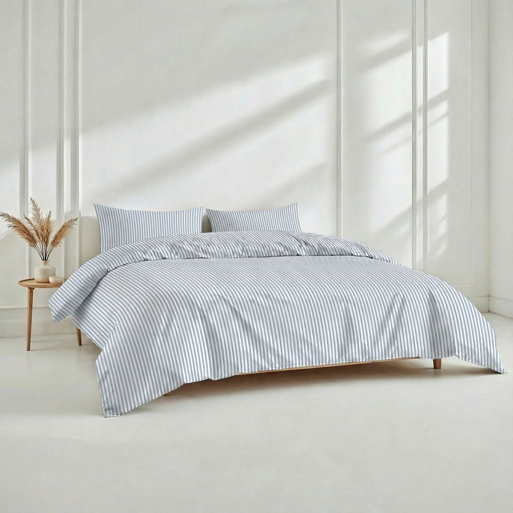 A bed set featuring soft long-staple cotton sateen fabric in a bedroom setting.