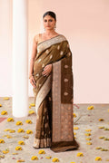 Olive green pure Katan handloom Banarasi silk saree showing detailed textile work.