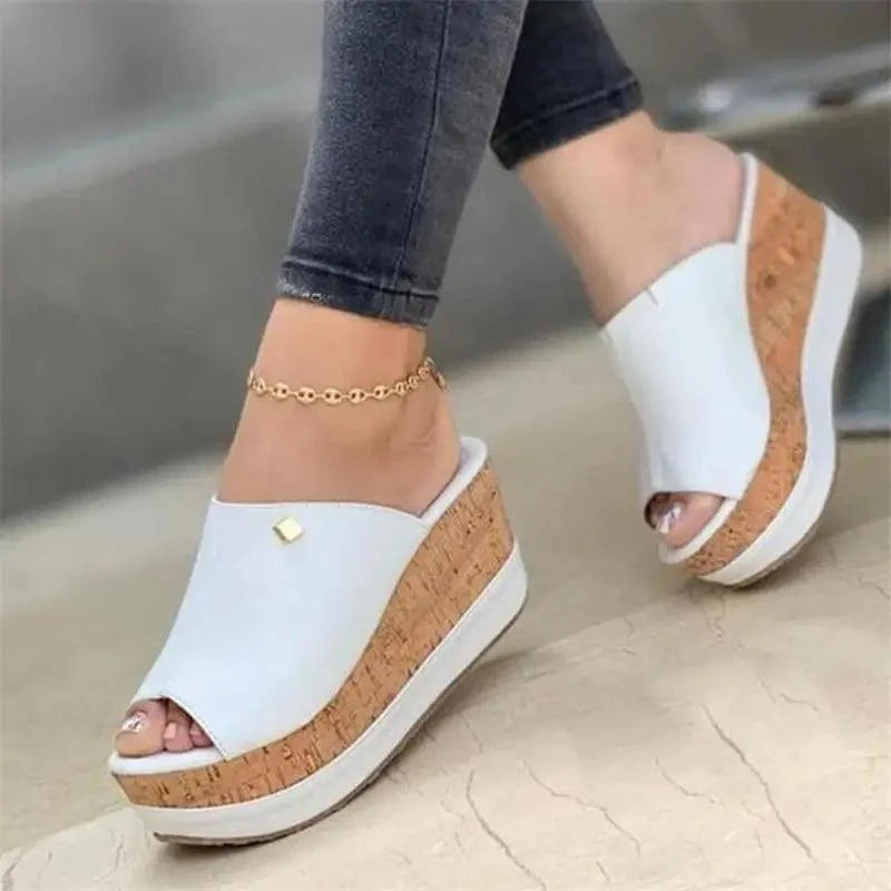 Elegant white peep-toe high heel sandals for women, suitable for summer formal or casual wear.