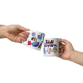 A 10oz white ceramic mug featuring colorful space-themed cats and whimsical illustrations designed by Anna.