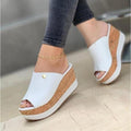 White peep toe platform sandals for women, featuring a non-slip rubber outsole and cushioned insole.